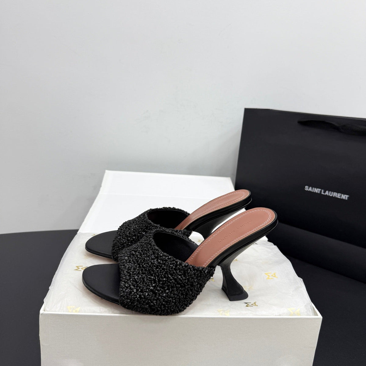AMINA M HEELS