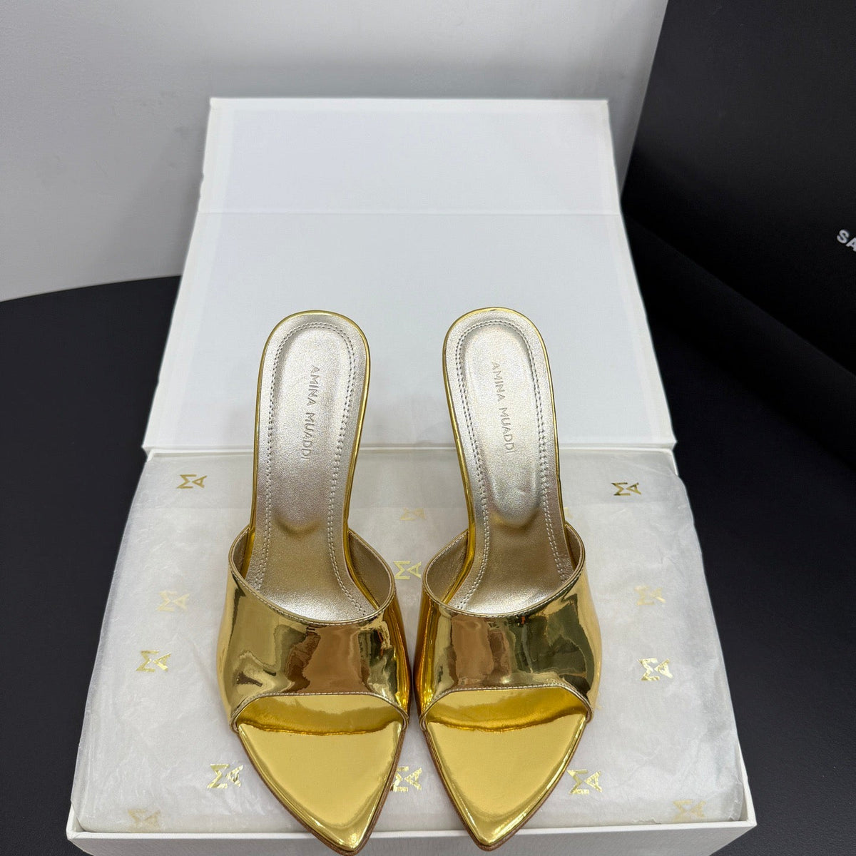 AMINA M HEELS