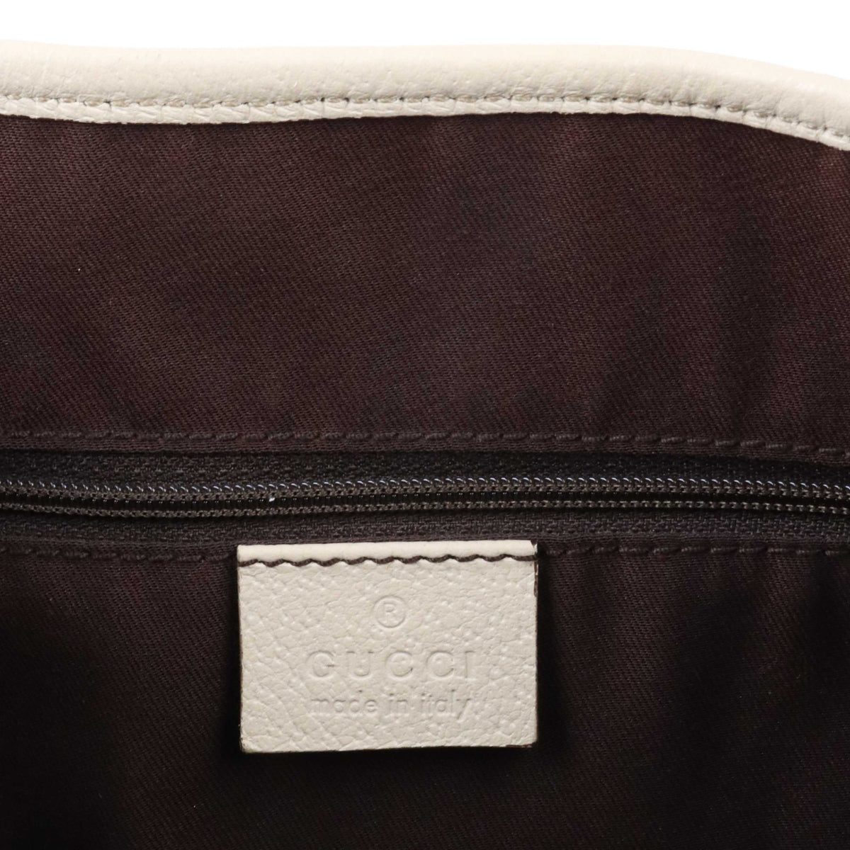 Gucci Supreme Tote with White Trim.