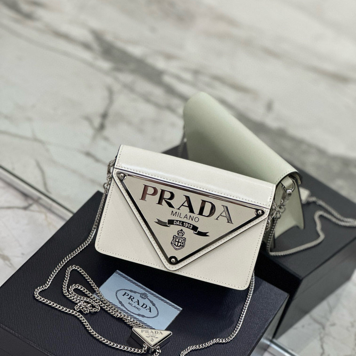 PD TRIANGLE LOGO BUFFED SHOULDER BAG