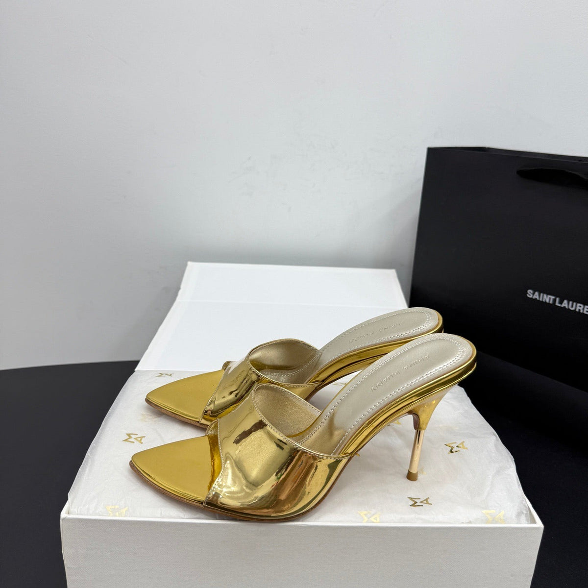 AMINA M HEELS