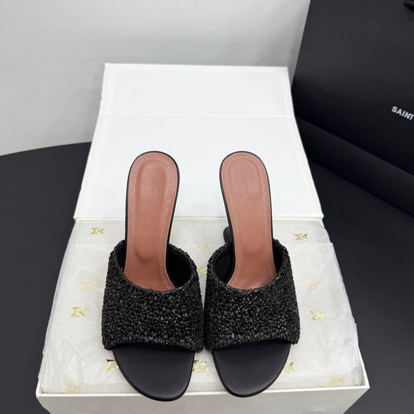 AMINA M HEELS