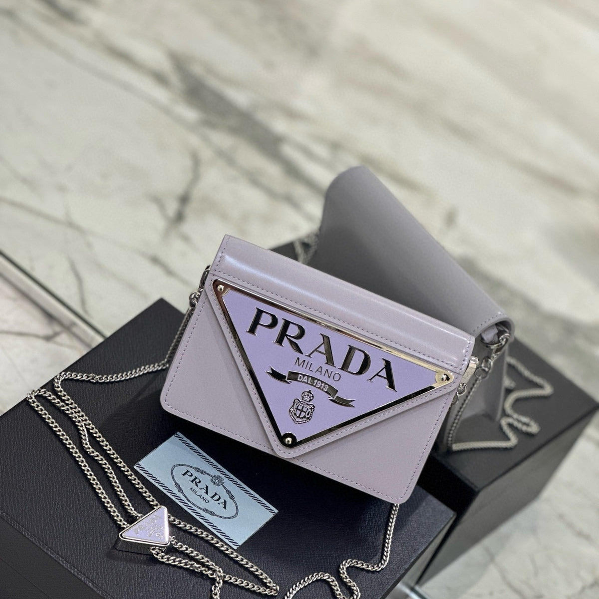 PD TRIANGLE LOGO BUFFED SHOULDER BAG