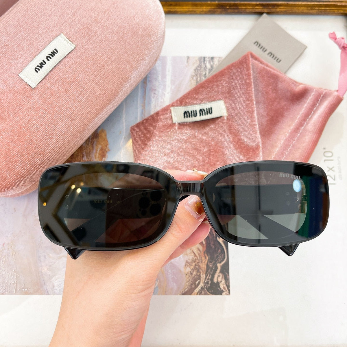 MIU M SUNGLASSES