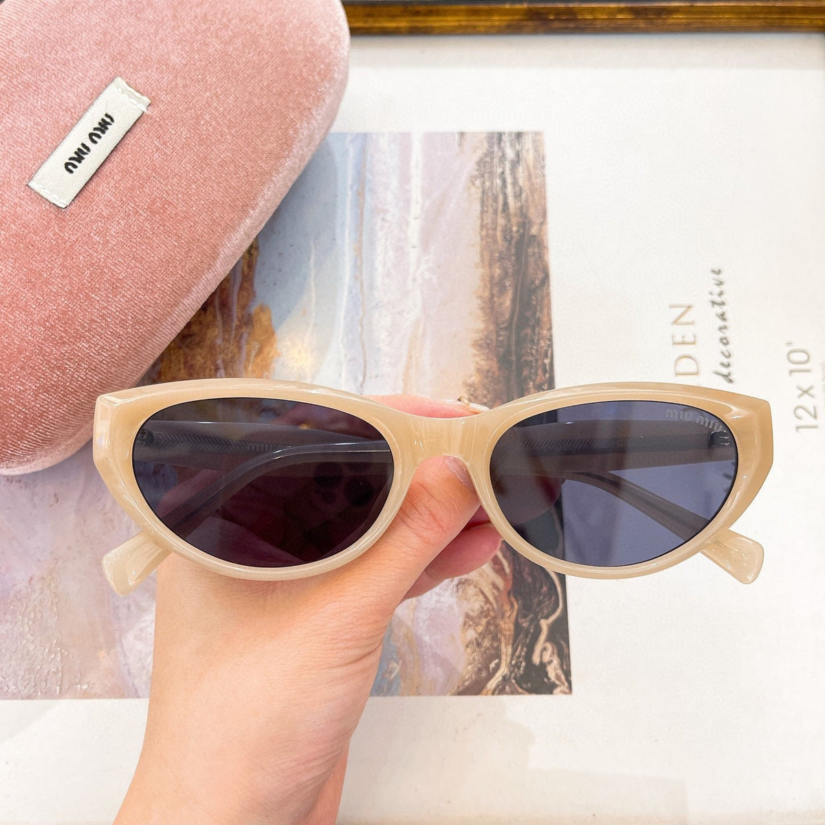 MIU M SUNGLASSES