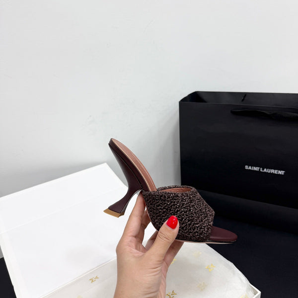 AMINA M HEELS