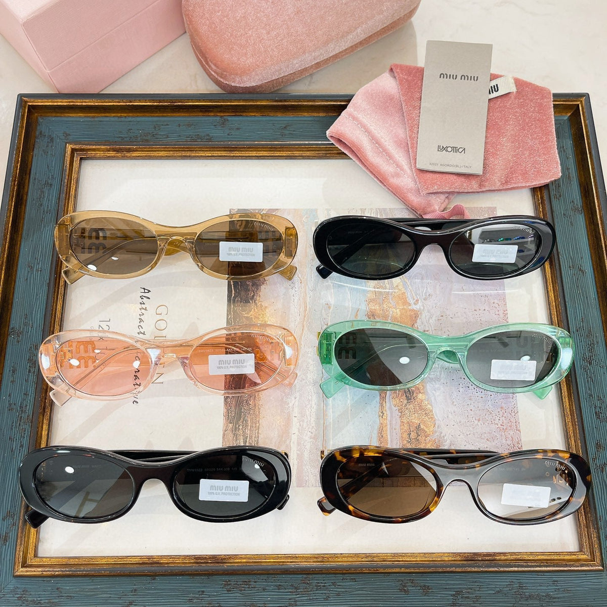MIU M SUNGLASSES