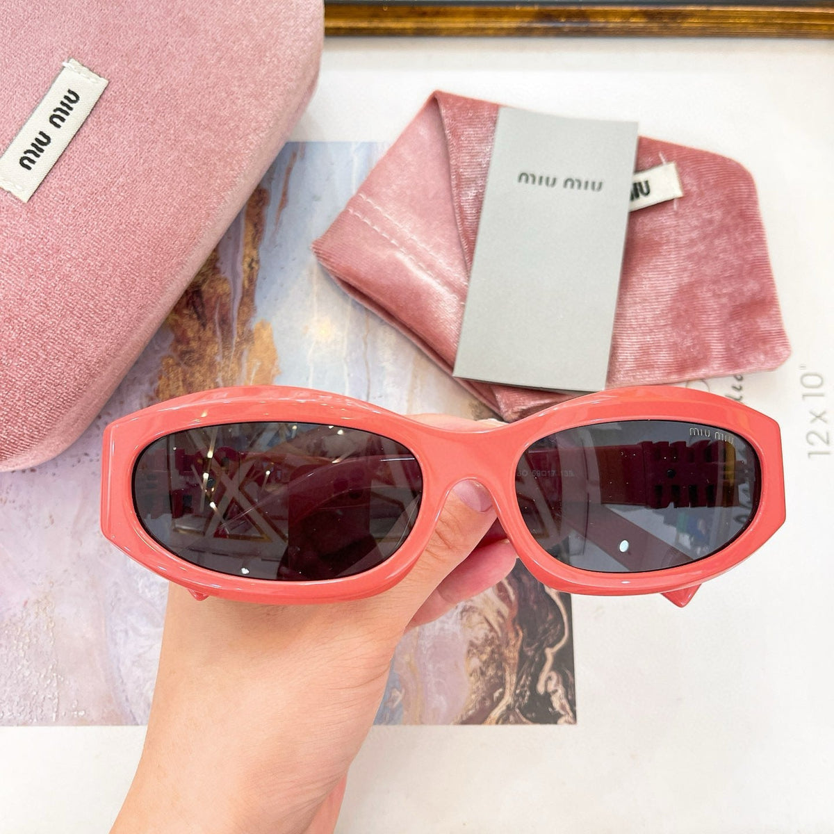 MIU M SUNGLASSES