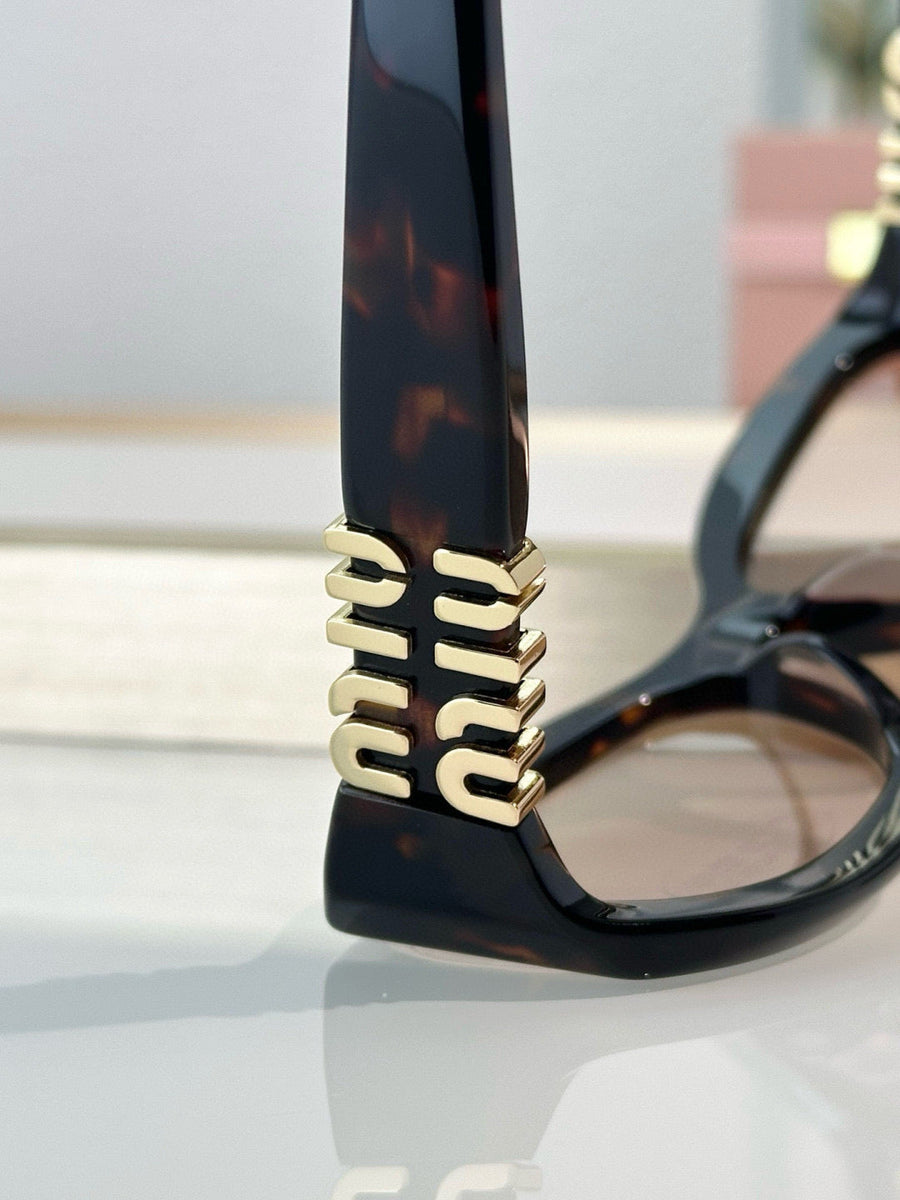 MIU M SUNGLASSES