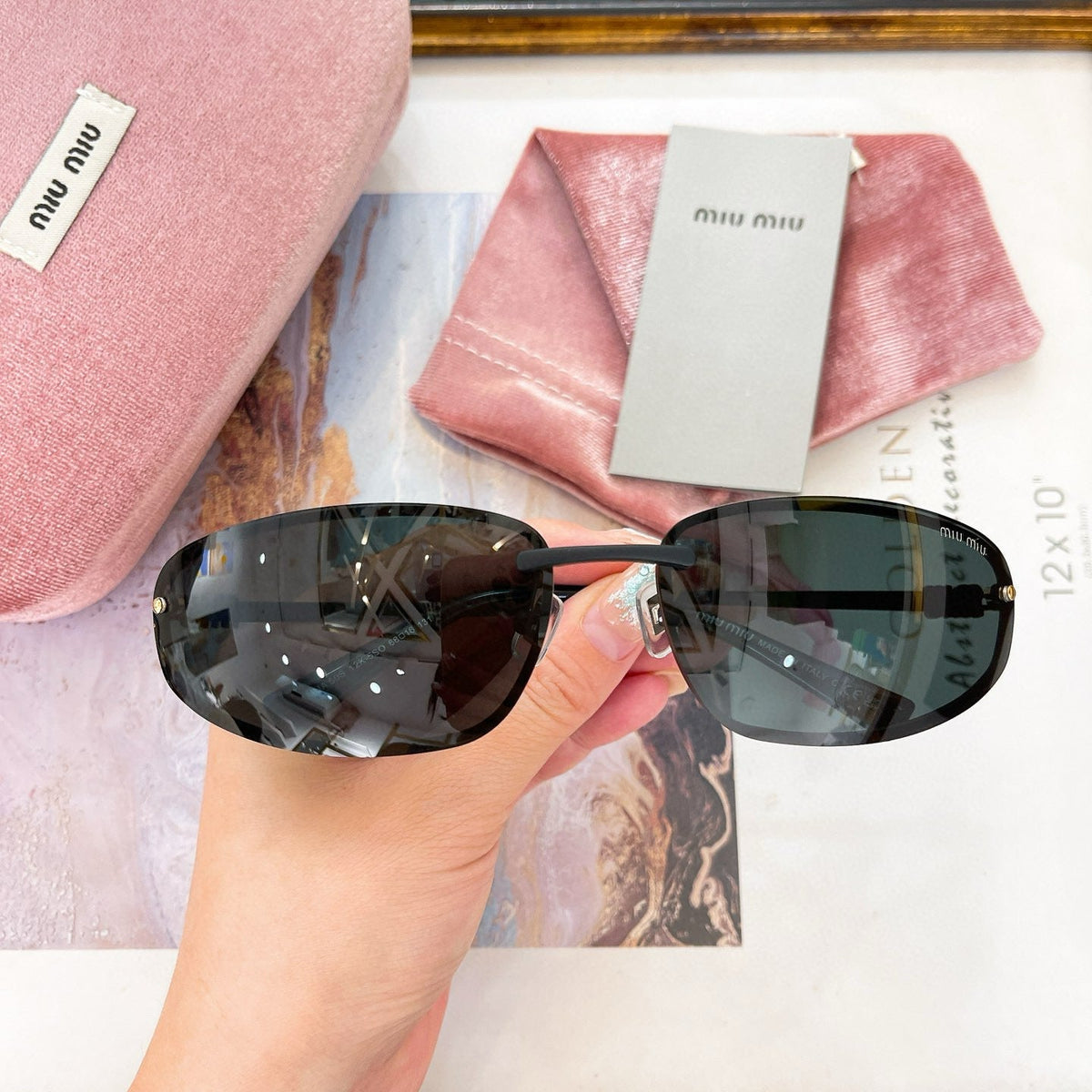 MIU M SUNGLASSES