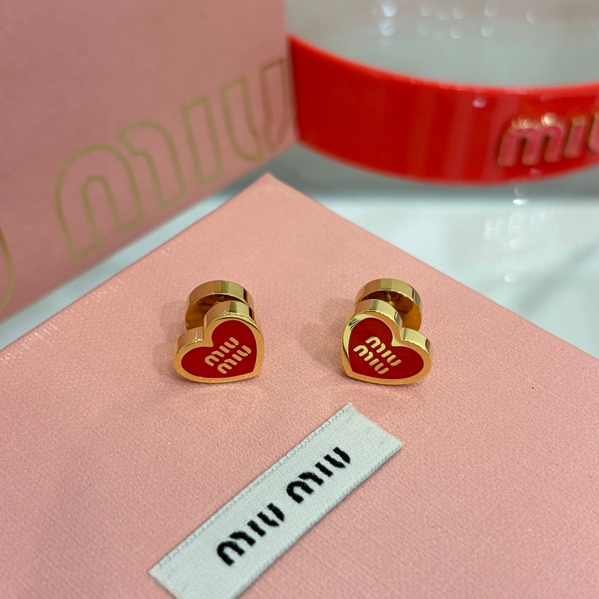 MIU M EARRINGS