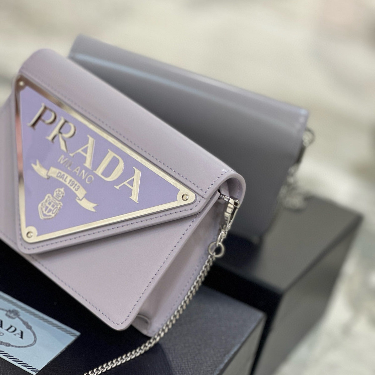 PD TRIANGLE LOGO BUFFED SHOULDER BAG