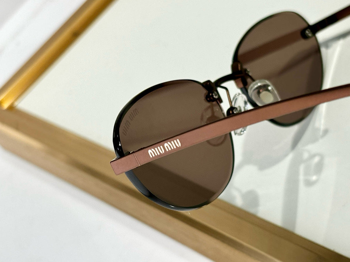 MIU M SUNGLASSES