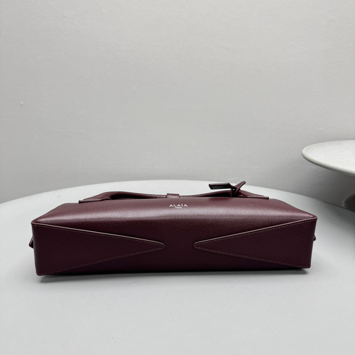 ALAIA LE TECKEL CLUTCH