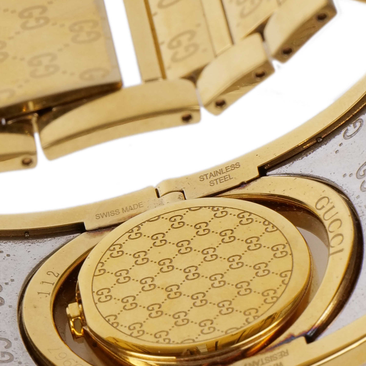 Gucci Twirl Reversible Gold Bracelet Watch.