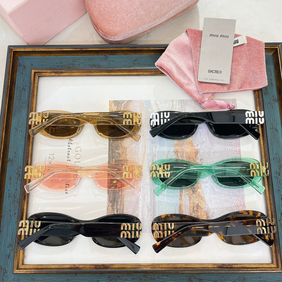MIU M SUNGLASSES
