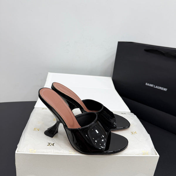 AMINA M HEELS
