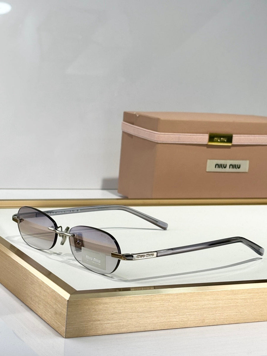 MIU M SUNGLASSES