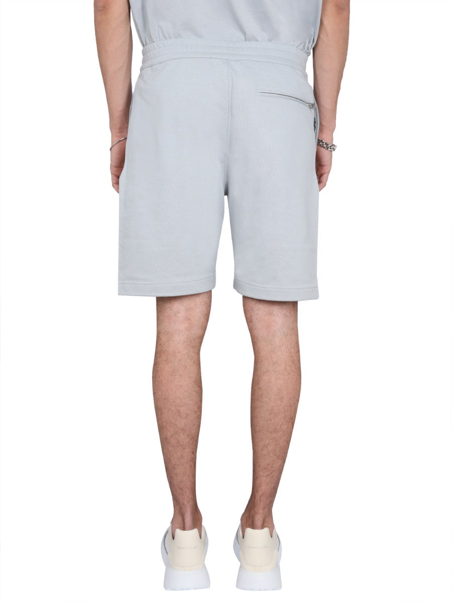 Alexander Mcqueen Men Bermuda Shorts With Graffiti Logo Print