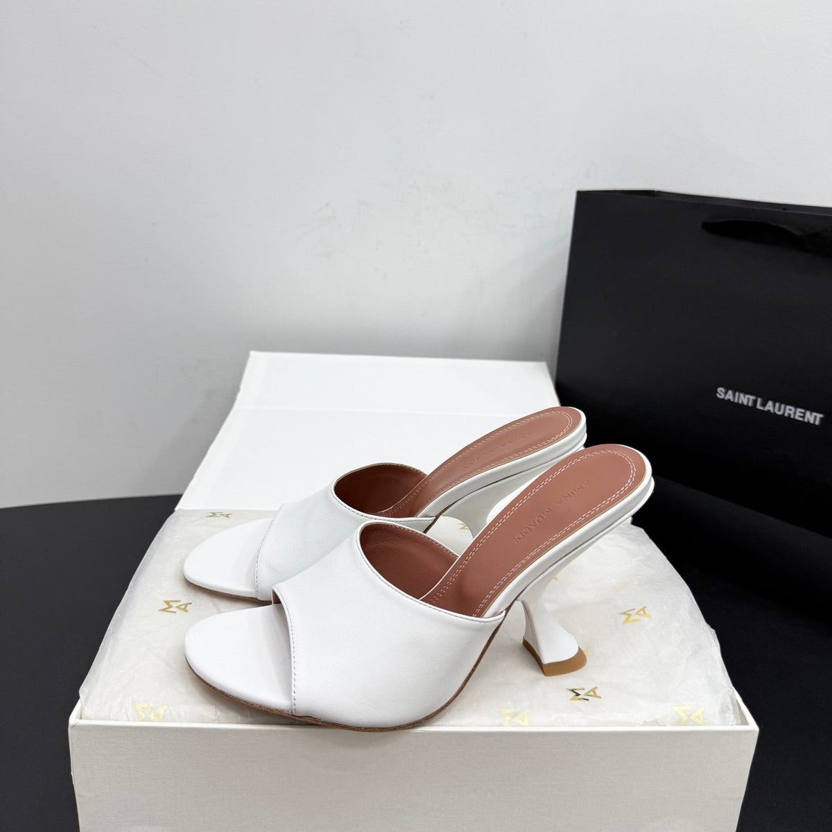 AMINA M HEELS