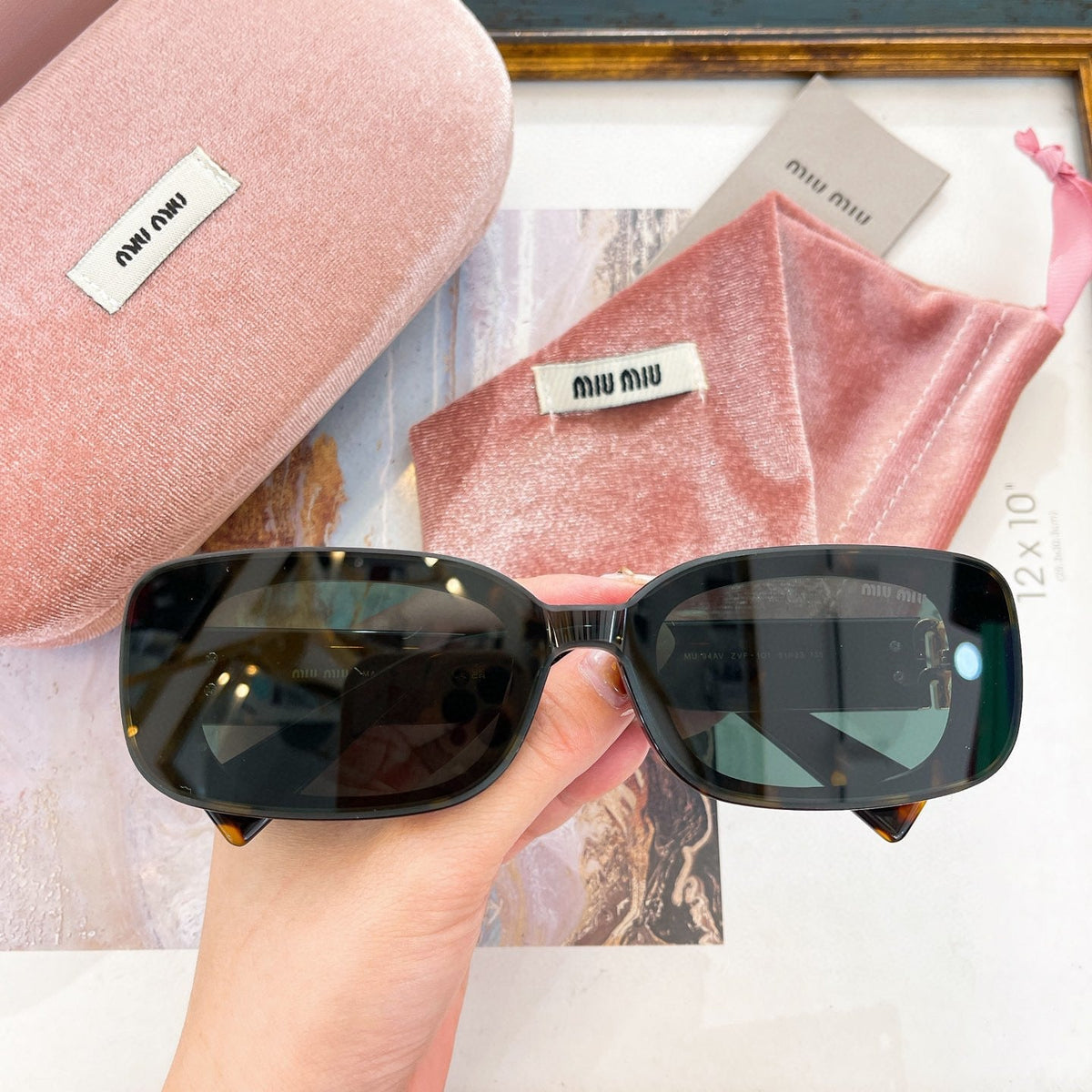 MIU M SUNGLASSES