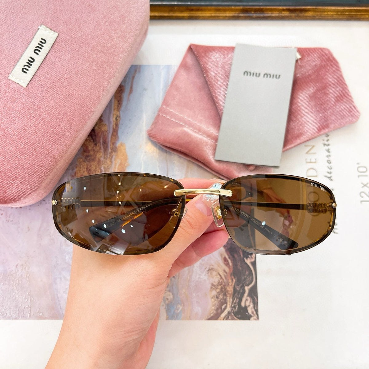 MIU M SUNGLASSES