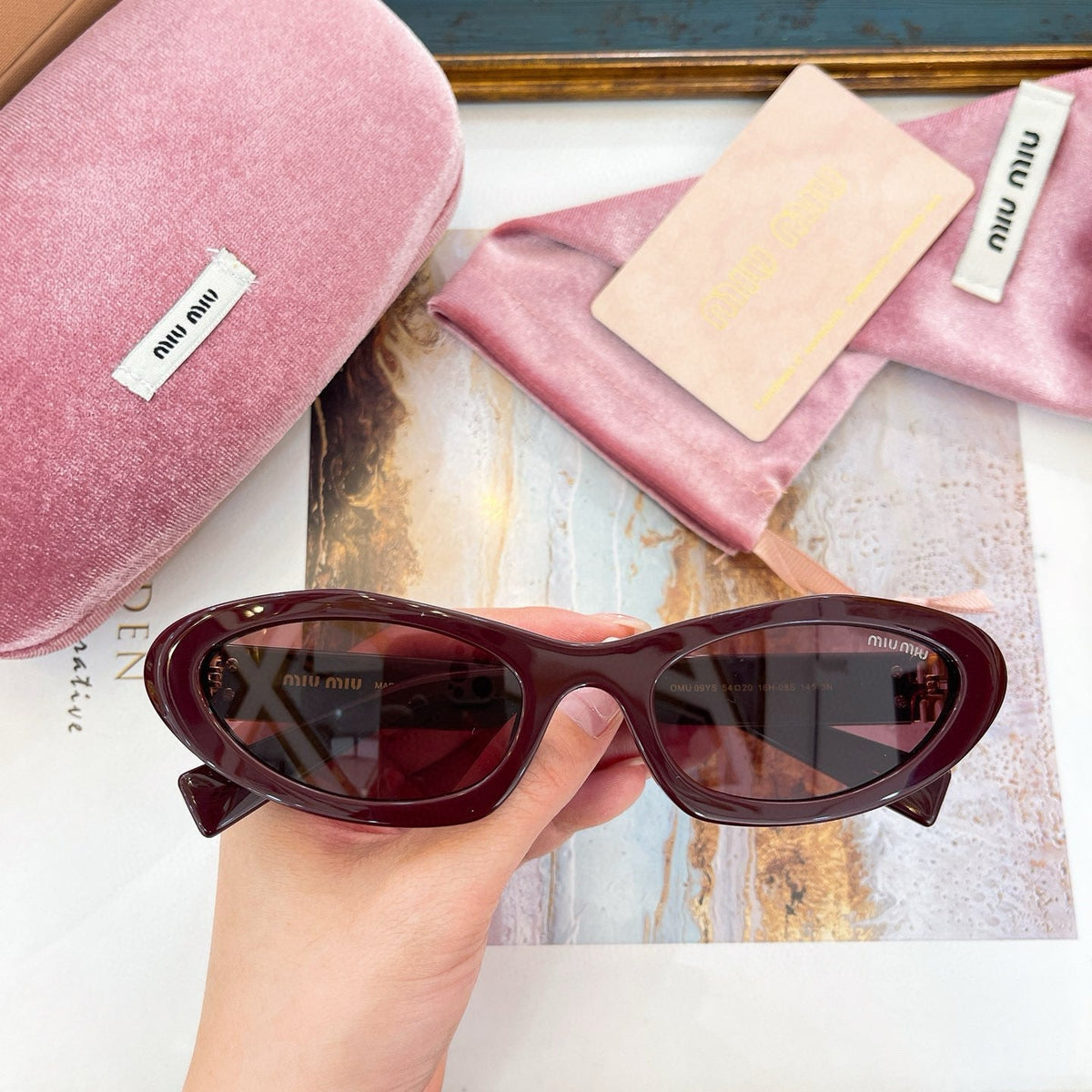 MIU M SUNGLASSES
