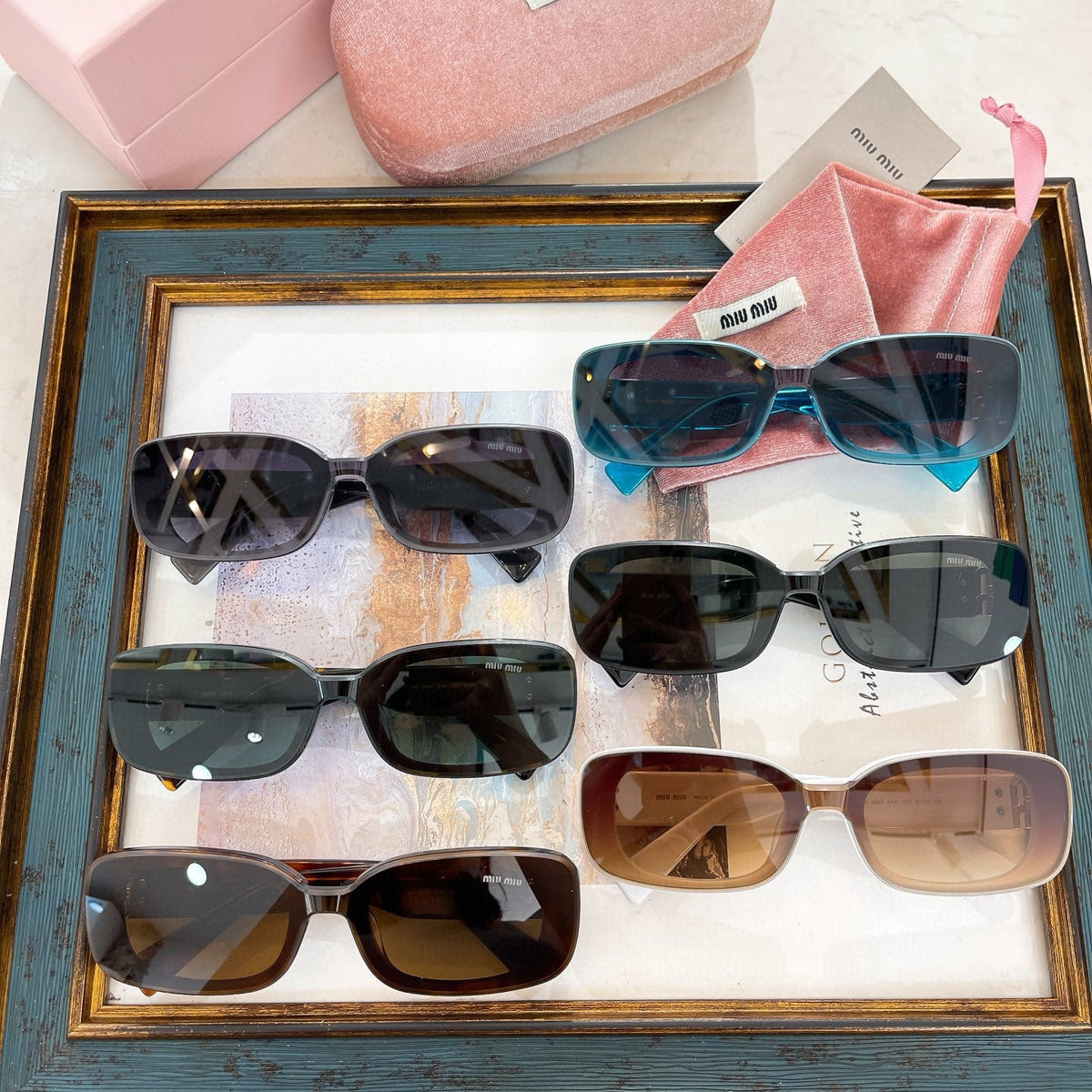 MIU M SUNGLASSES