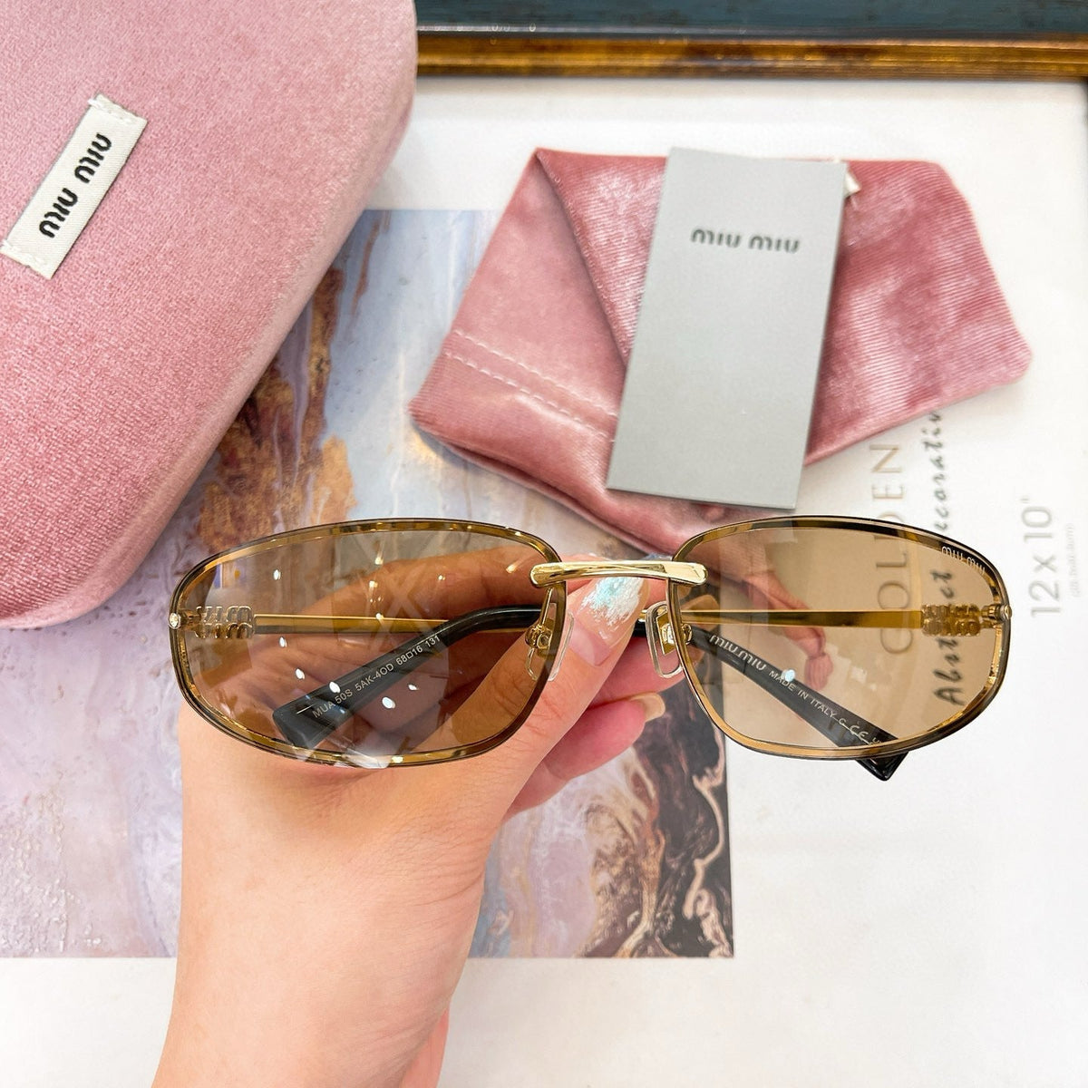 MIU M SUNGLASSES