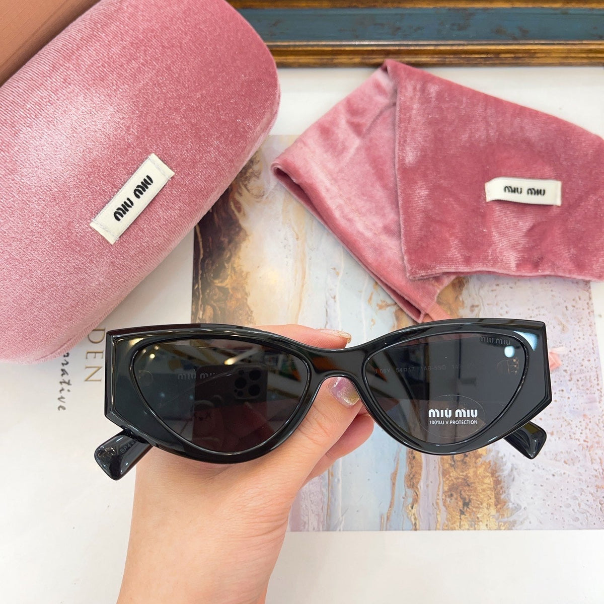 MIU M SUNGLASSES