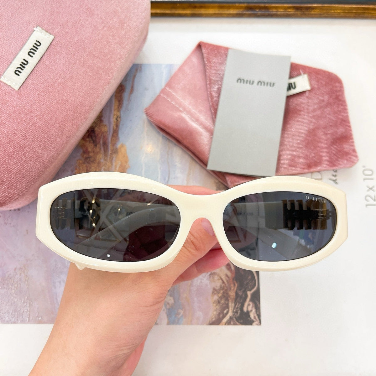 MIU M SUNGLASSES