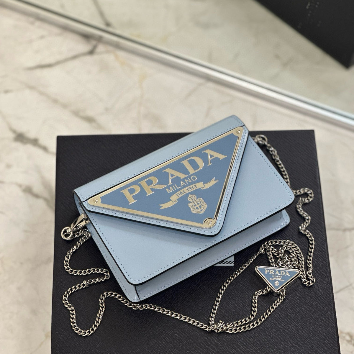 PD TRIANGLE LOGO BUFFED SHOULDER BAG
