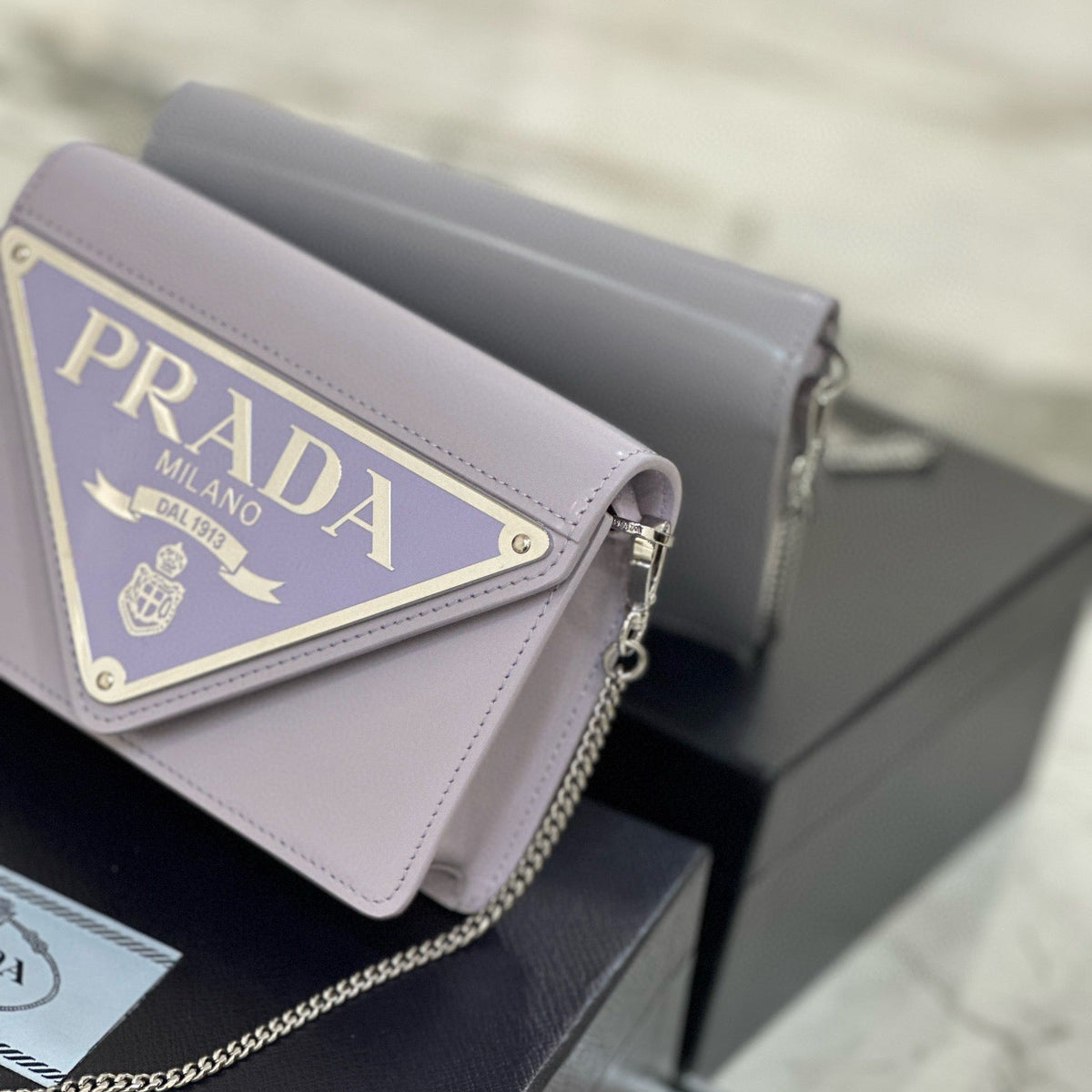 PD TRIANGLE LOGO BUFFED SHOULDER BAG