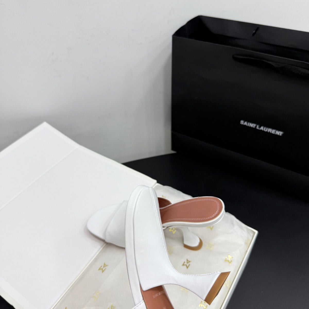AMINA M HEELS