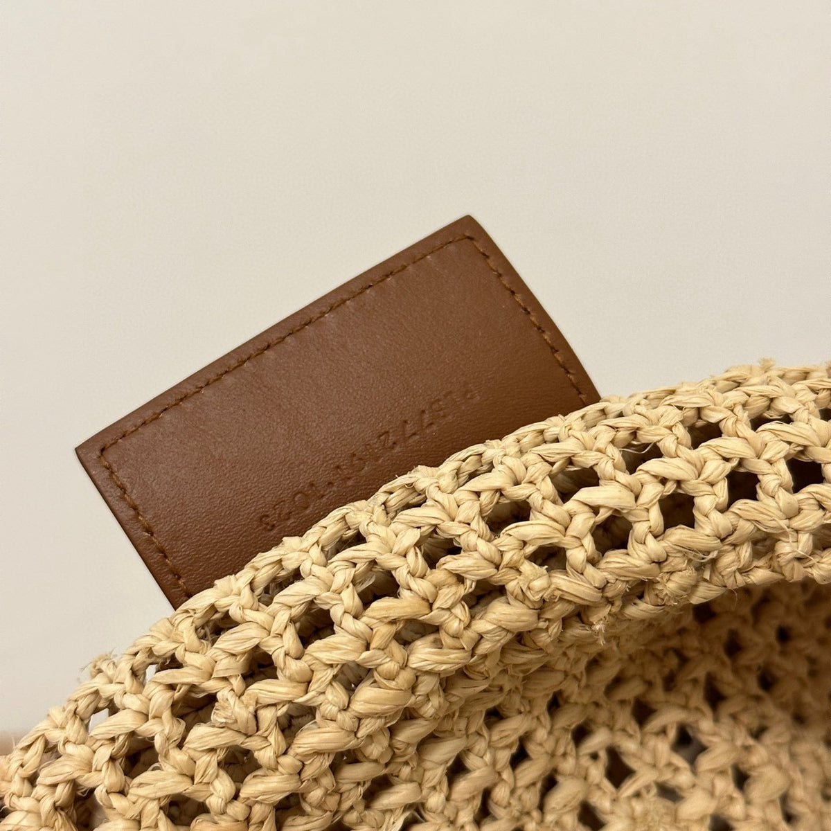 SL ICARE IN RAFFIA BAG