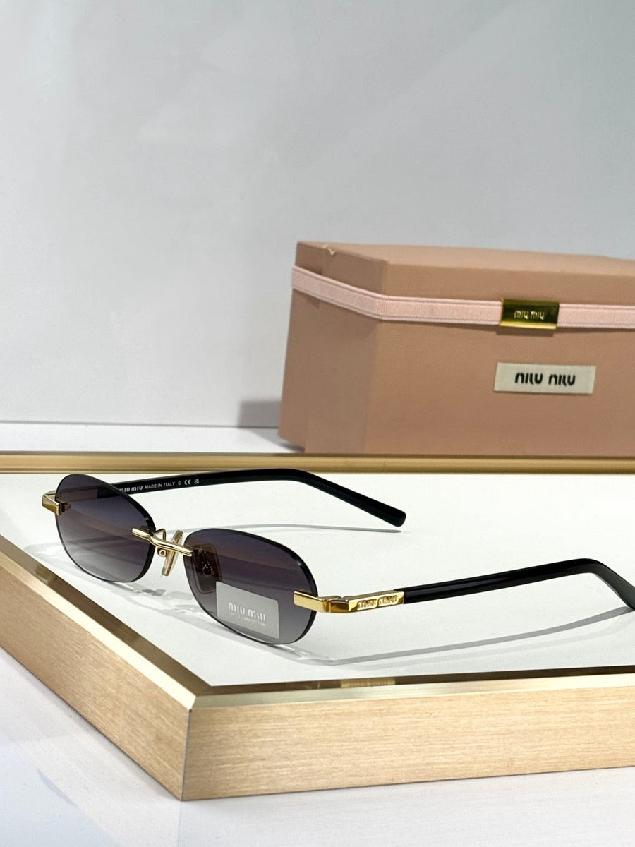MIU M SUNGLASSES