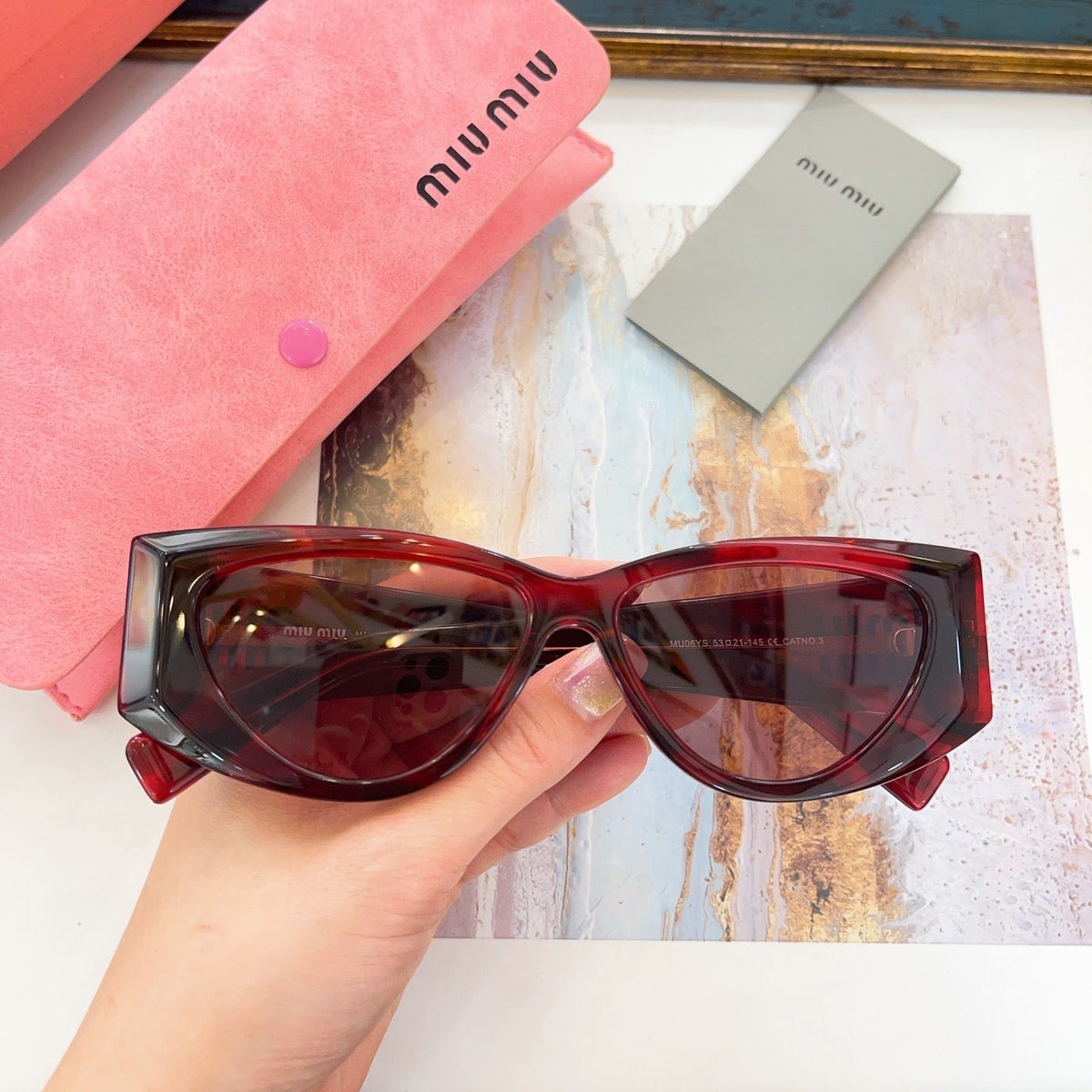 MIU M SUNGLASSES