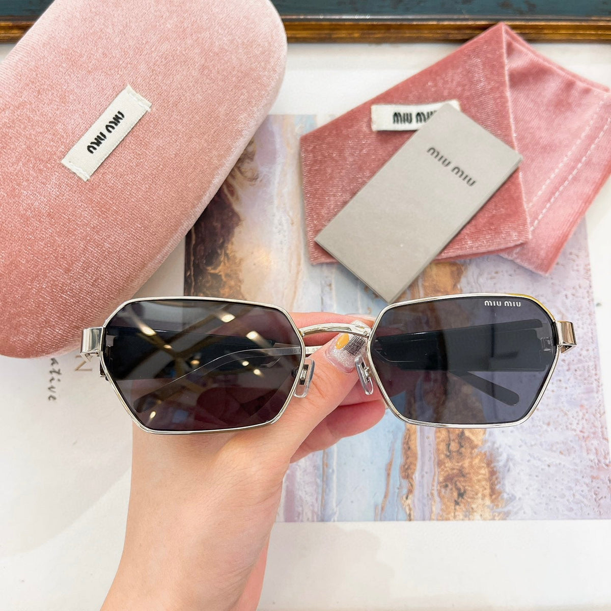 MIU M SUNGLASSES