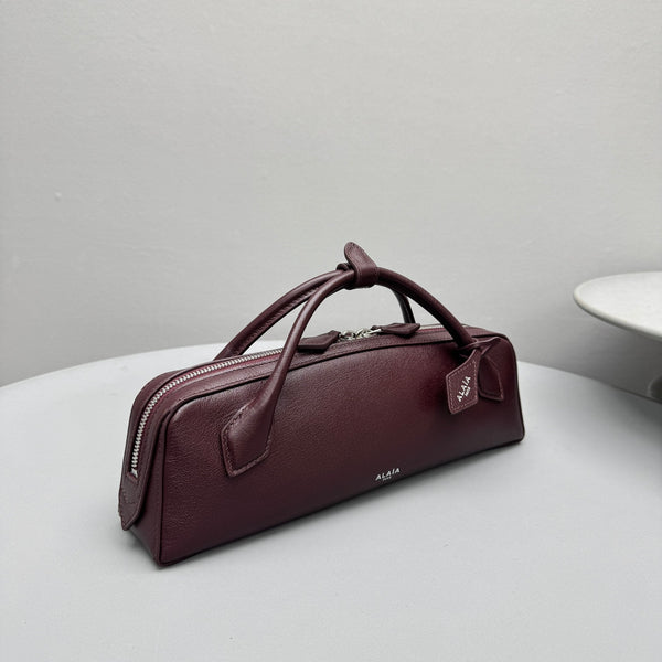 ALAIA LE TECKEL CLUTCH