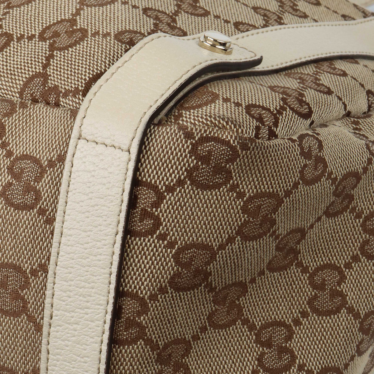 Gucci Supreme Tote with White Trim.