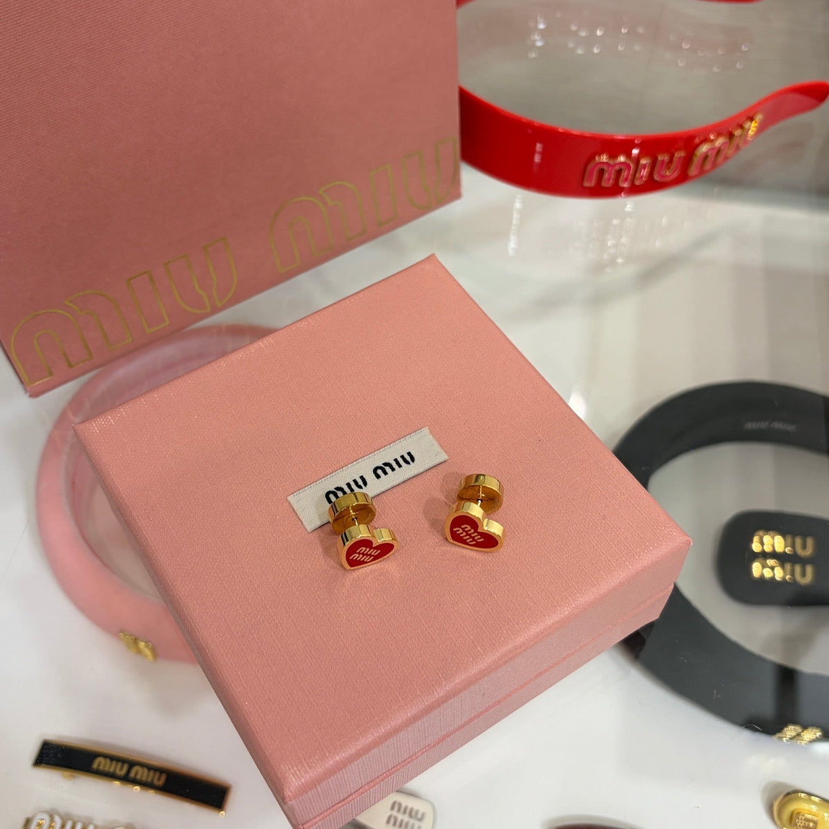 MIU M EARRINGS