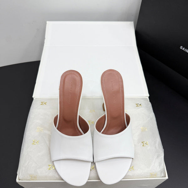 AMINA M HEELS