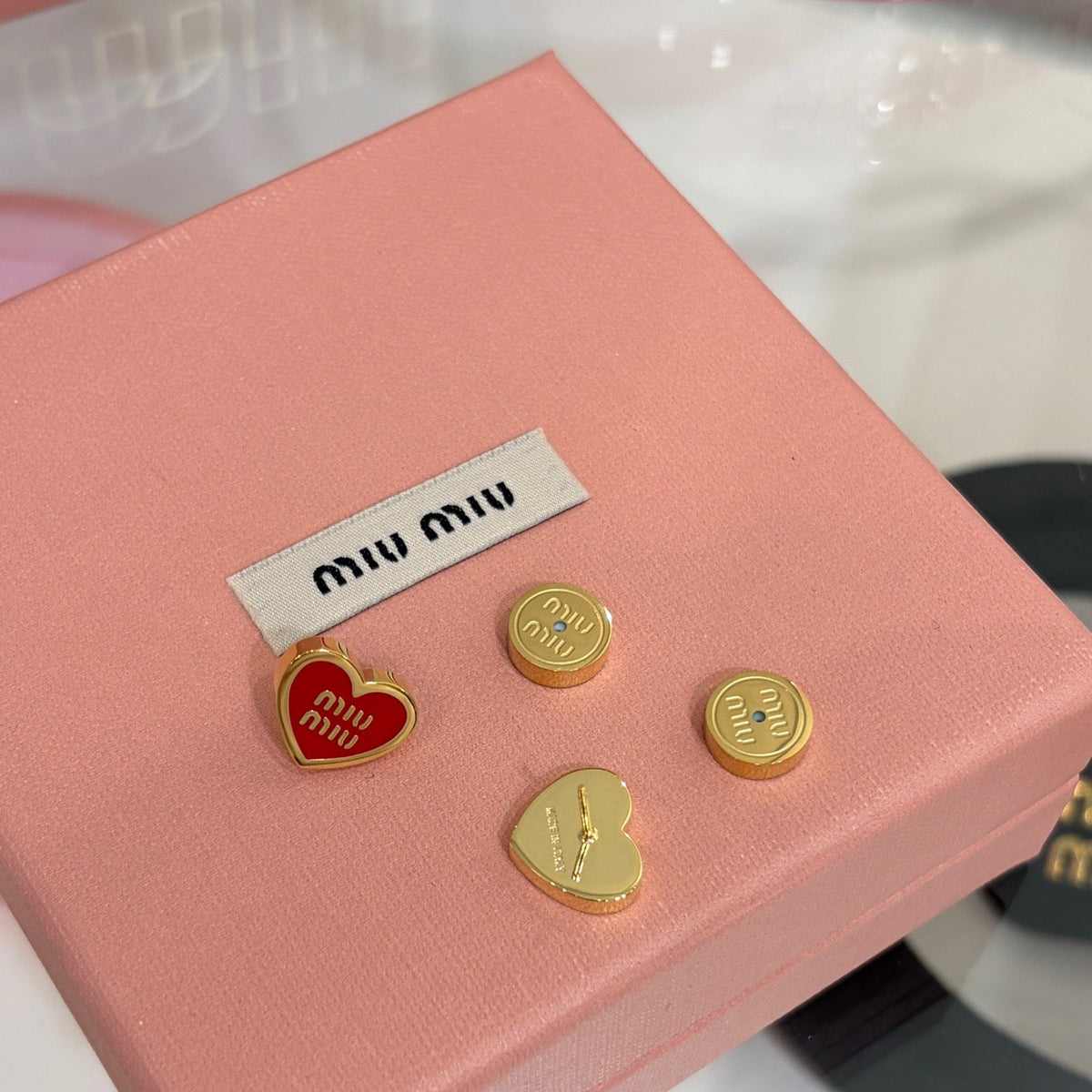 MIU M EARRINGS