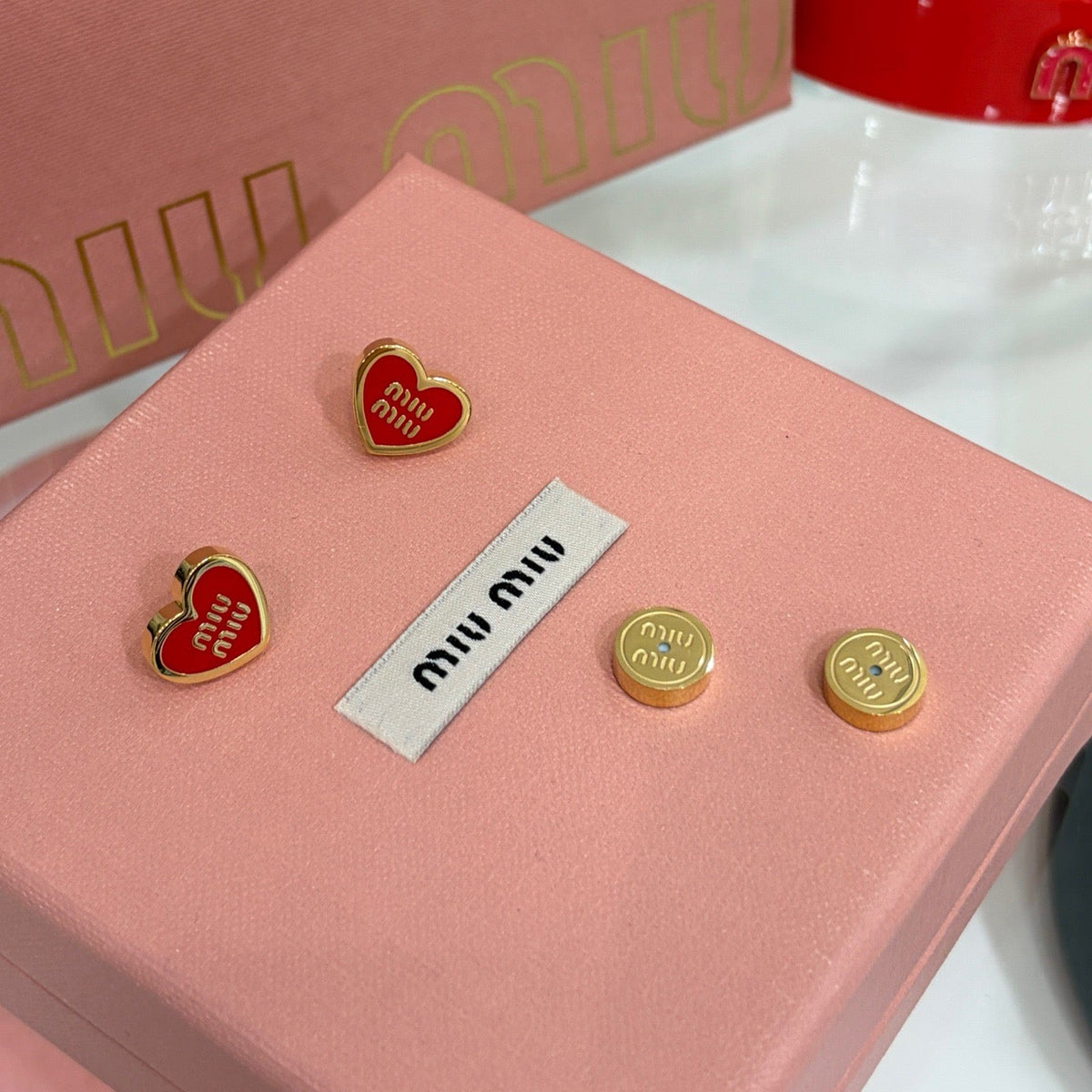 MIU M EARRINGS