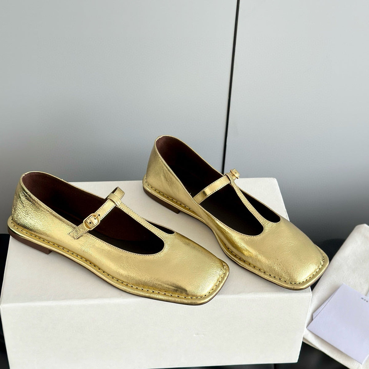 THE ROW T STRAP FLATS
