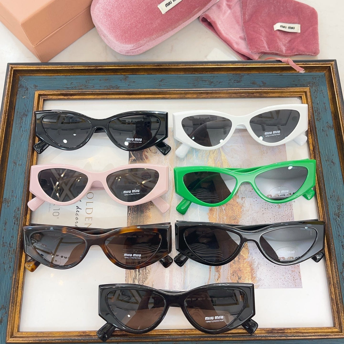 MIU M SUNGLASSES