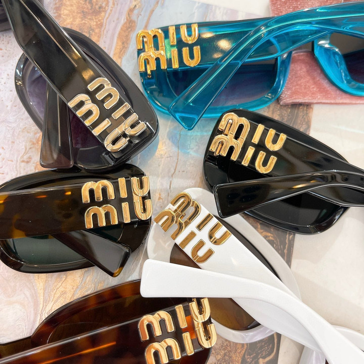 MIU M SUNGLASSES