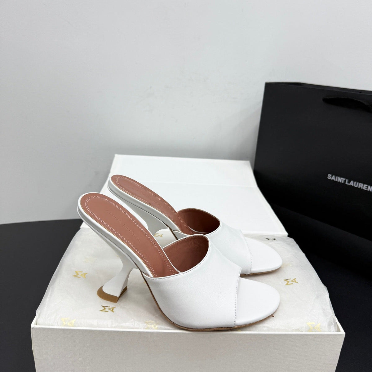 AMINA M HEELS