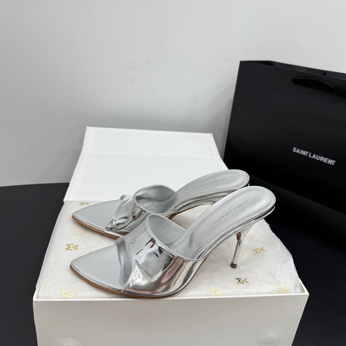 AMINA M HEELS