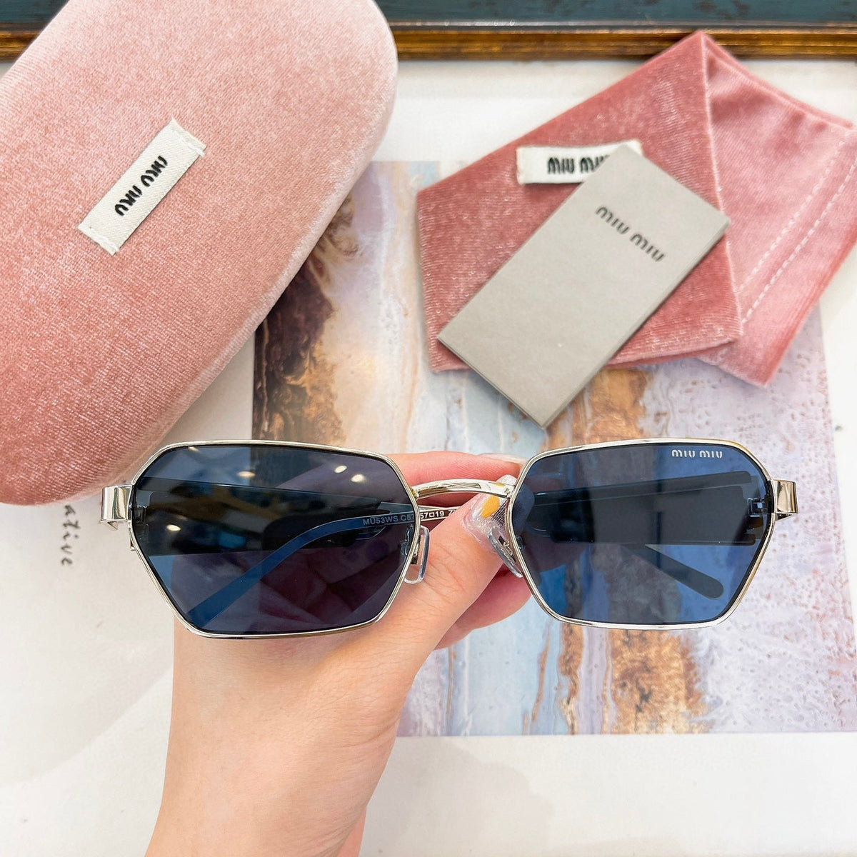 MIU M SUNGLASSES
